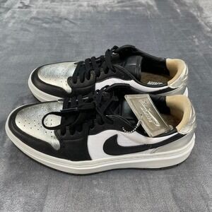 Women Jordan 1 Low black and silver trainers. Size US 9